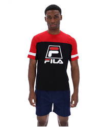 Displays a model wearing the Black 'Fila' branded Damon Cut and Sew Tee