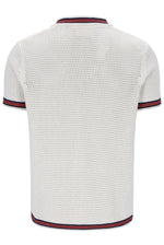 White textured polo shirt with red and blue trim on a white background