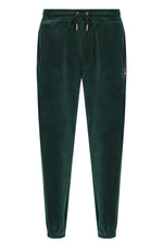 Displays the Pine Needle 'FILA' branded Eddie 2 Velour Track Pant