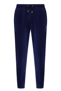 Displays the Navy 'Fila' branded Eddie 2 Velour Track Pant