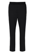 Black textured pants on a white background