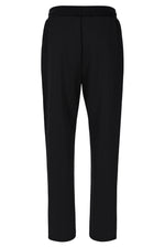 Black textured pants on a white background