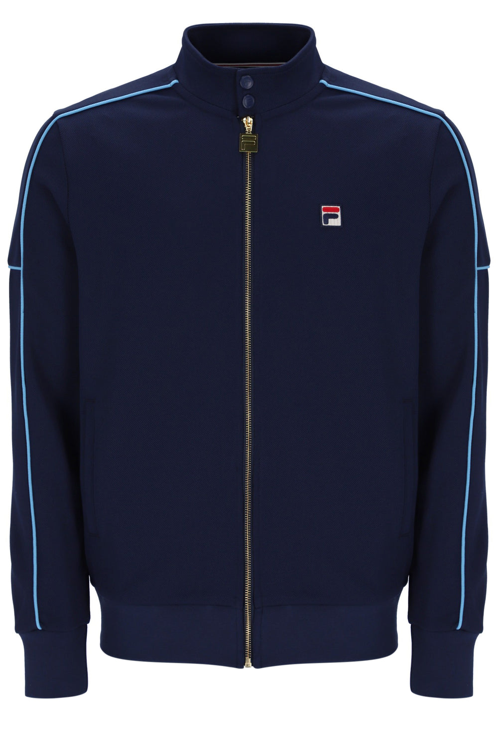 A navy blue Fila zip-up track jacket with light blue piping along the shoulders and sleeves, featuring a small Fila logo patch on the left chest.