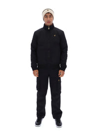 Displays a model wearing the Black 'FILA' branded Etton Bomber Jacket