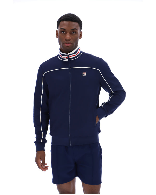 Displays a model wearing the Navy 'FILA' Federico Tipped Neck Track Top