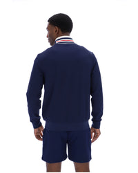 Displays a model wearing the Navy 'FILA' Federico Tipped Neck Track Top