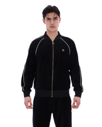 Displays a model wearing the Black 'FILA' Fella Velour Jacket