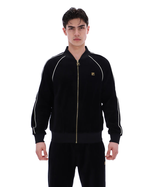 Displays a model wearing the Black 'FILA' Fella Velour Jacket