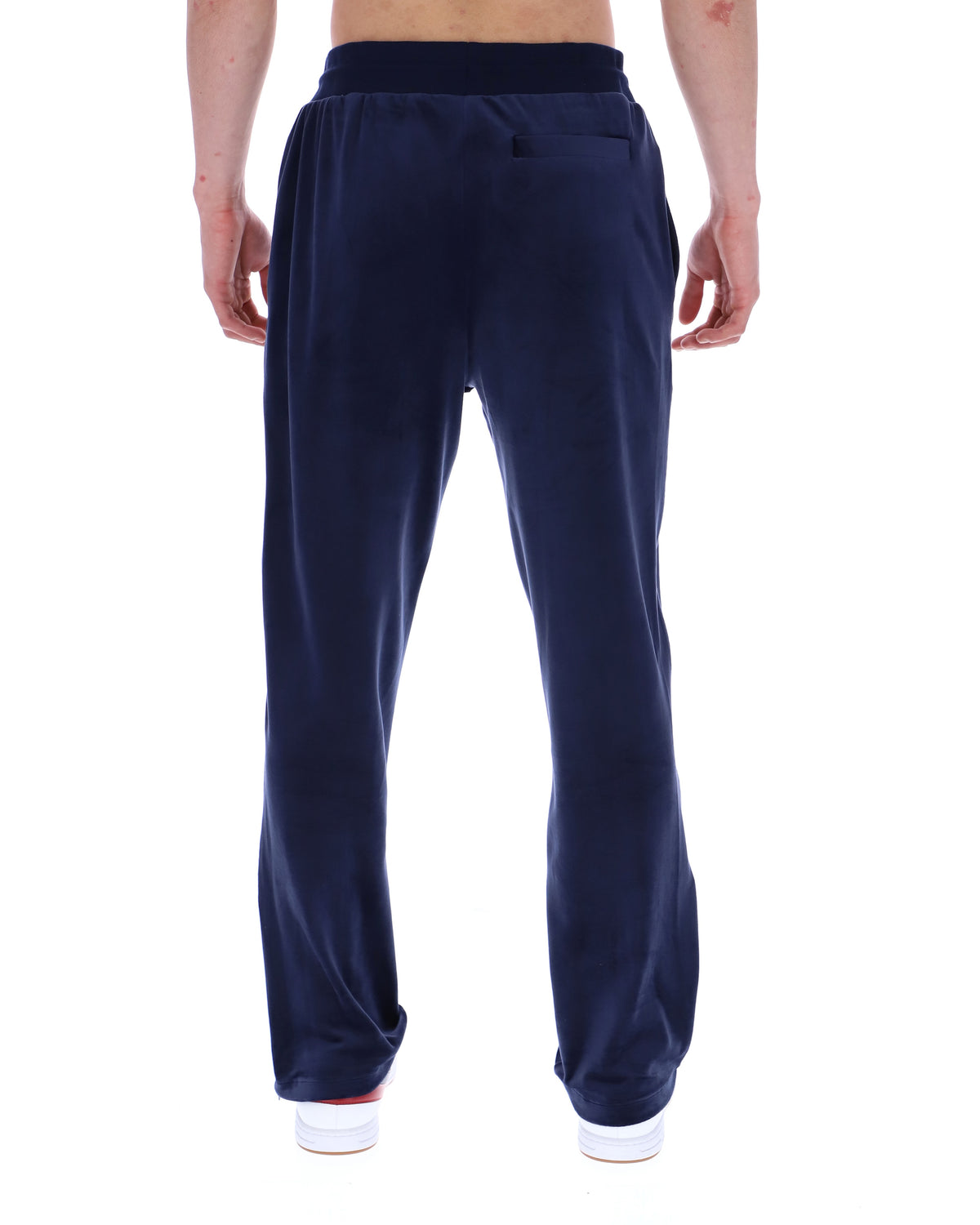 Navy blue sweatpants worn by a person on a white background