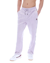 Displays the model wearing the Misty Lilac 'FILA' branded Fio Velour Straight-Leg Jogger 