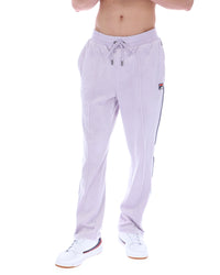 Displays the model wearing the Misty Lilac 'FILA' branded Fio Velour Straight-Leg Jogger