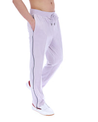 Displays the model wearing the Misty Lilac 'FILA' branded Fio Velour Straight-Leg Jogger