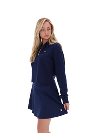 Displays a model wearing the Navy 'FILA' branded Fiorella 1/4 Zip Up Hoodie