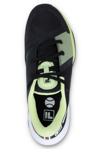 A pair of FILA Fire Ace trainers with black, green, and white colour scheme and the FILA logo visible on the side.