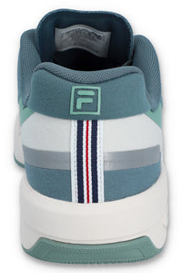 A pair of FILA FX-25 FILA TRAINER sneakers with a low-top design, primarily in green and blue colour tones, featuring the FILA logo on the side.