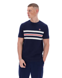 Man wearing a navy blue t-shirt with horizontal stripes on a white background