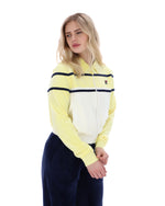 Woman wearing a yellow and white striped sweater with a logo on a white background