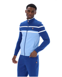 Displays a model wearing the Frozen Fjord 'FILA' branded Giovanni Contrast Panels Track Top