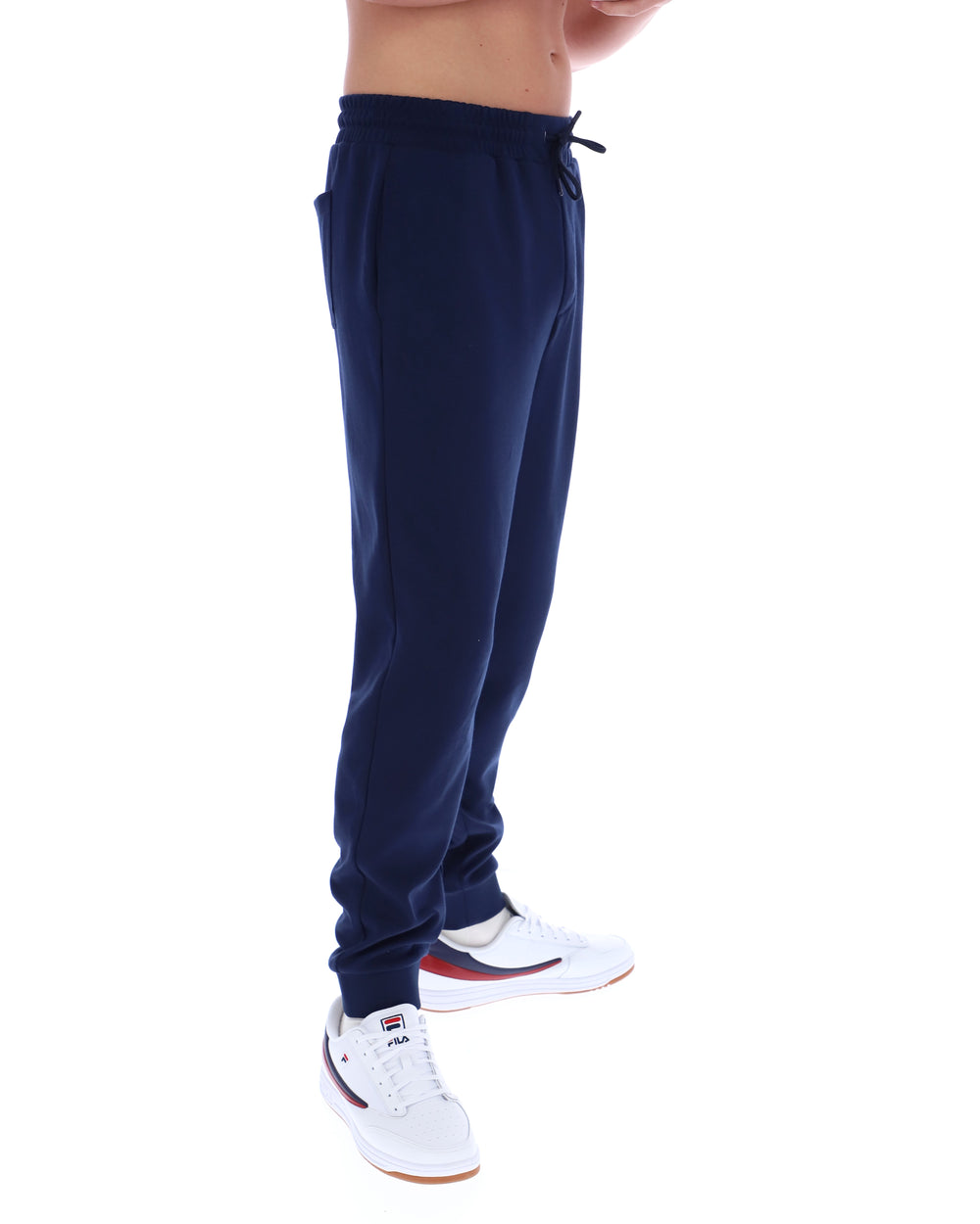 Navy blue sweatpants worn by a person on a white background