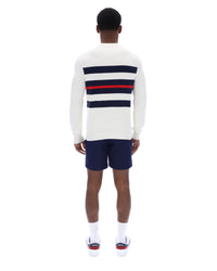Displays a model wearing the Gardenia 'FILA' branded Giuseppe Mesh Stripe Knitted Crew Neck