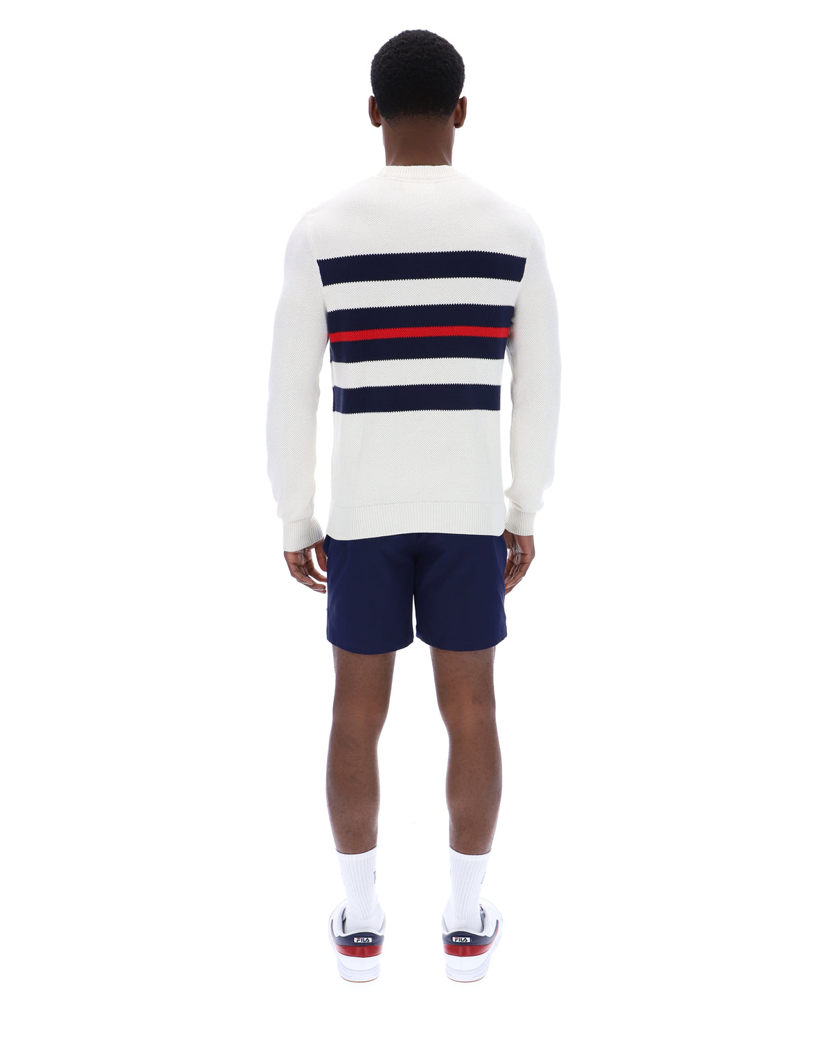 Displays a model wearing the Gardenia 'FILA' branded Giuseppe Mesh Stripe Knitted Crew Neck