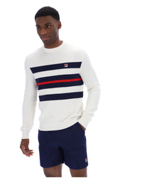 Displays a model wearing the Gardenia 'FILA' branded Giuseppe Mesh Stripe Knitted Crew Neck
