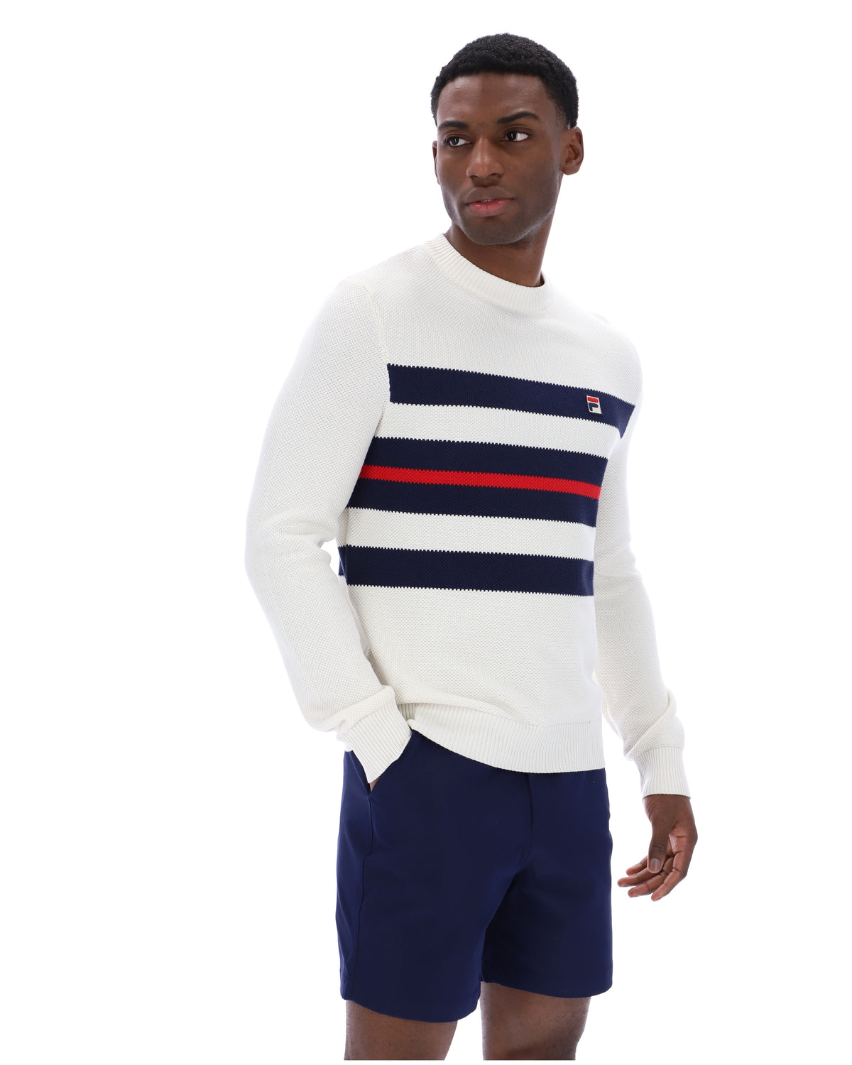 Displays a model wearing the Gardenia 'FILA' branded Giuseppe Mesh Stripe Knitted Crew Neck