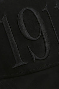 Displays the Black 'FILA' branded Hazza Large 1911 Embroidered Mesh-Back Cap featuring the 1911 branding 
