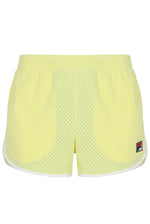 Yellow mesh shorts with a brand logo on a white background