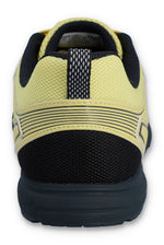 Yellow and black athletic shoe on a white background