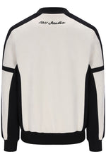 A colorblock crewneck sweatshirt shown from the back, featuring an off-white body with black shoulder, sleeve, and hem panels, and '1911 Italia' embroidered in black script at the top collar.