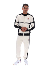Displays a model wearing the Gardenia/ Black 'FILA' branded Isaac Colour Blocked Baseball Jacket