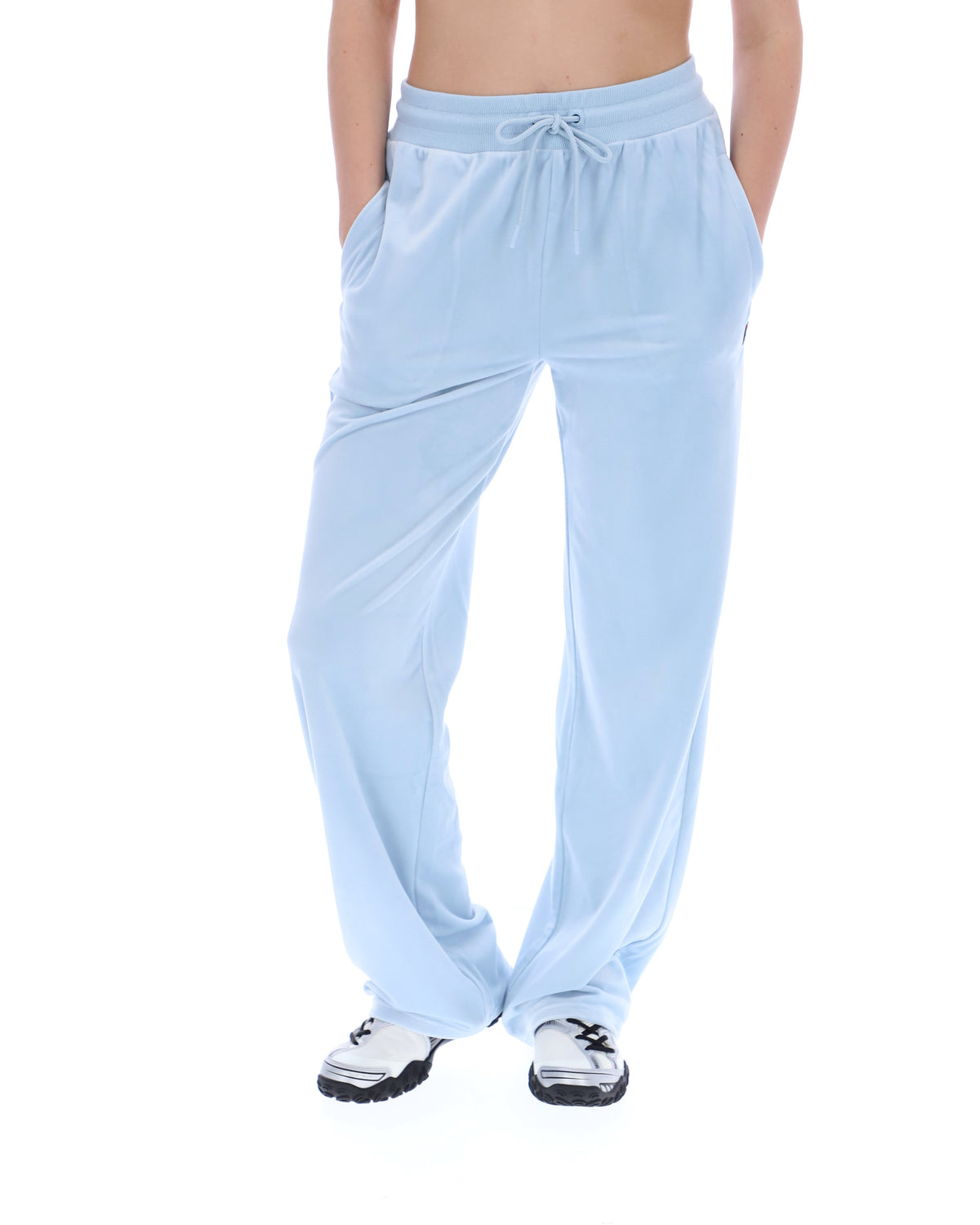 Light blue pants worn by a person on a white background