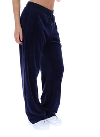 Navy blue sweatpants worn by a person on a white background