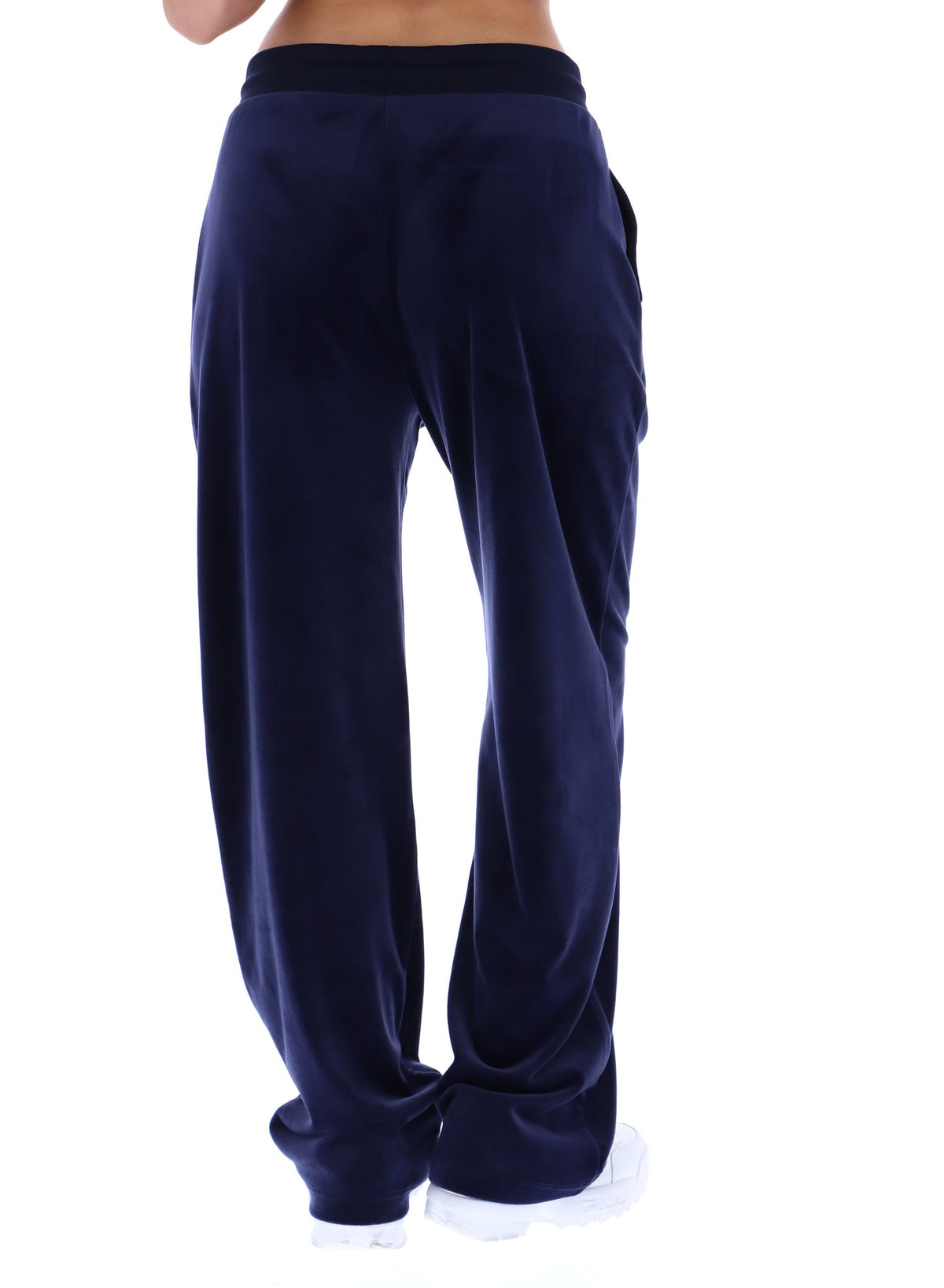Navy blue velvet pants on a white background