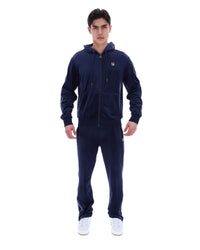 Displays a model wearing the Navy 'Fila' branded Italo Velour Hoodie