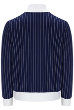 A navy blue pinstripe jacket with white vertical stripes, featuring a white collar, cuffs, and hem, displayed on a mannequin against a white background.