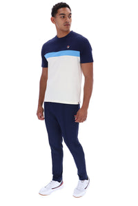 A man modeling a short-sleeve athletic t-shirt and matching jogger pants set. The t-shirt features a navy blue upper chest and shoulders, a light blue horizontal stripe, and a large white lower body.