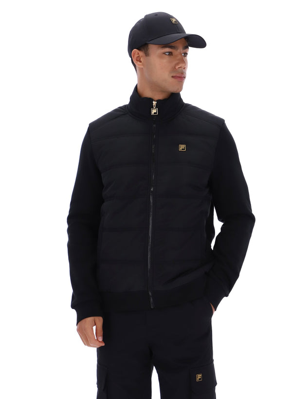Displays a model wearing the Black 'FILA' branded Jerry Full Zip Padded Jacket