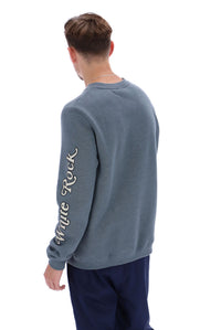 Displays a model wearing the Stormy Weather 'FILA' branded Len Graphic Crew Sweatshirt