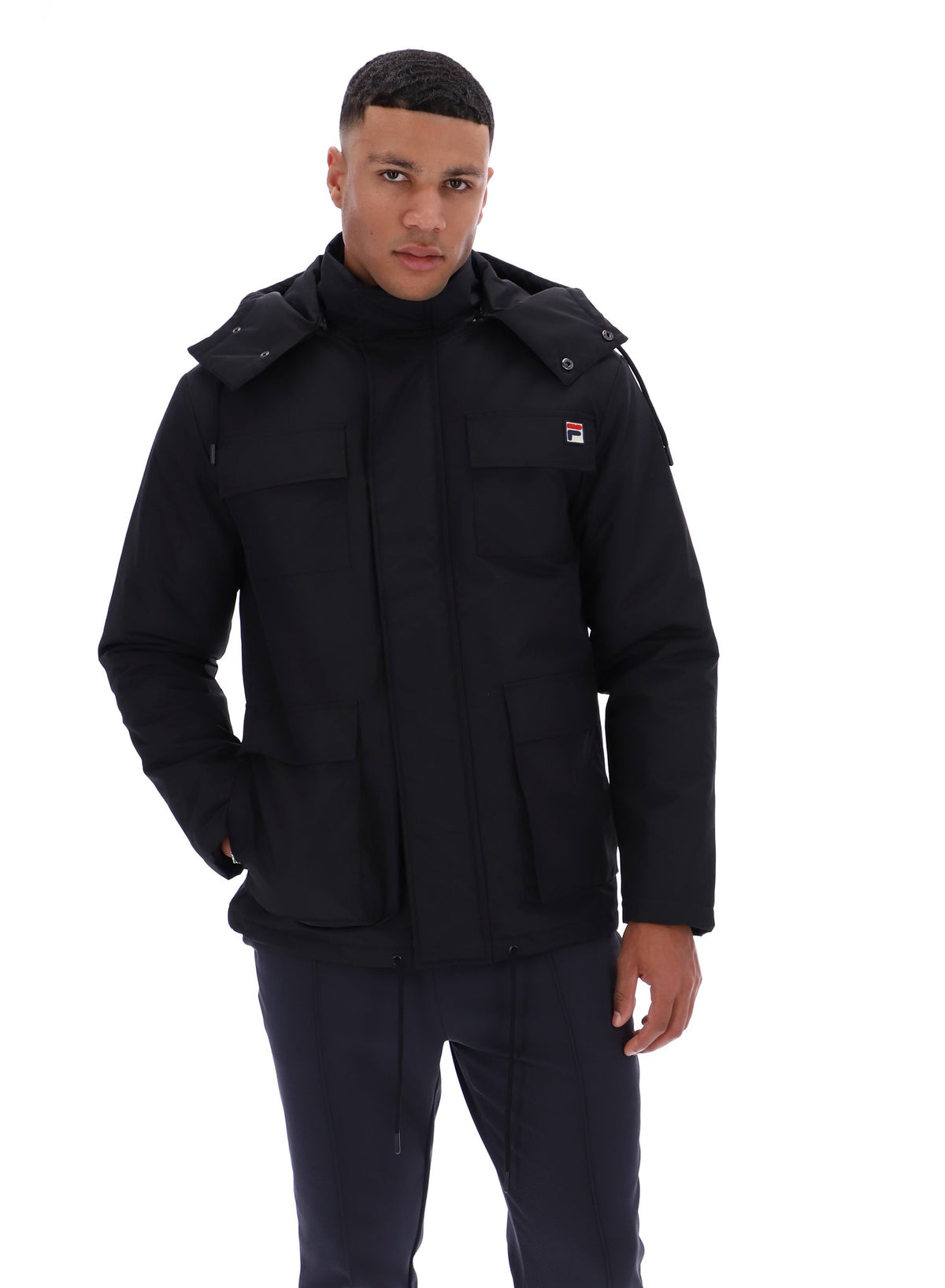 Displays a model wearing the Black 'FILA' branded Liam Cargo Padded Jacket