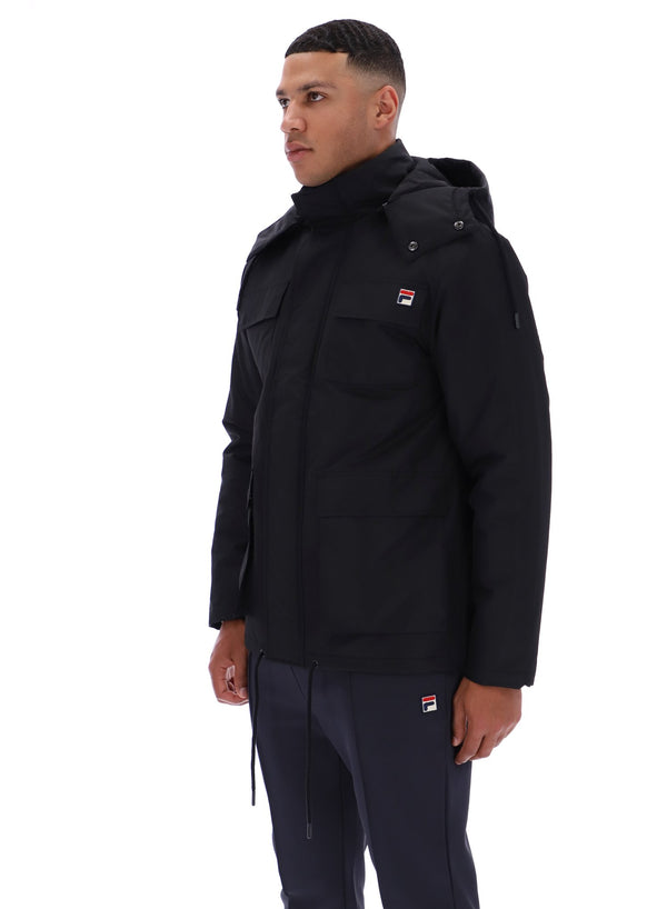 Displays a model wearing the Black 'FILA' branded Liam Cargo Padded Jacket