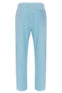 Light blue velour pants on a white background