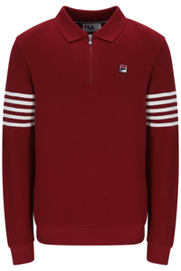 Displays the Sun Dried Tomato and White 'FILA' branded Luis 1/2 Zip Long Sleeve Polo