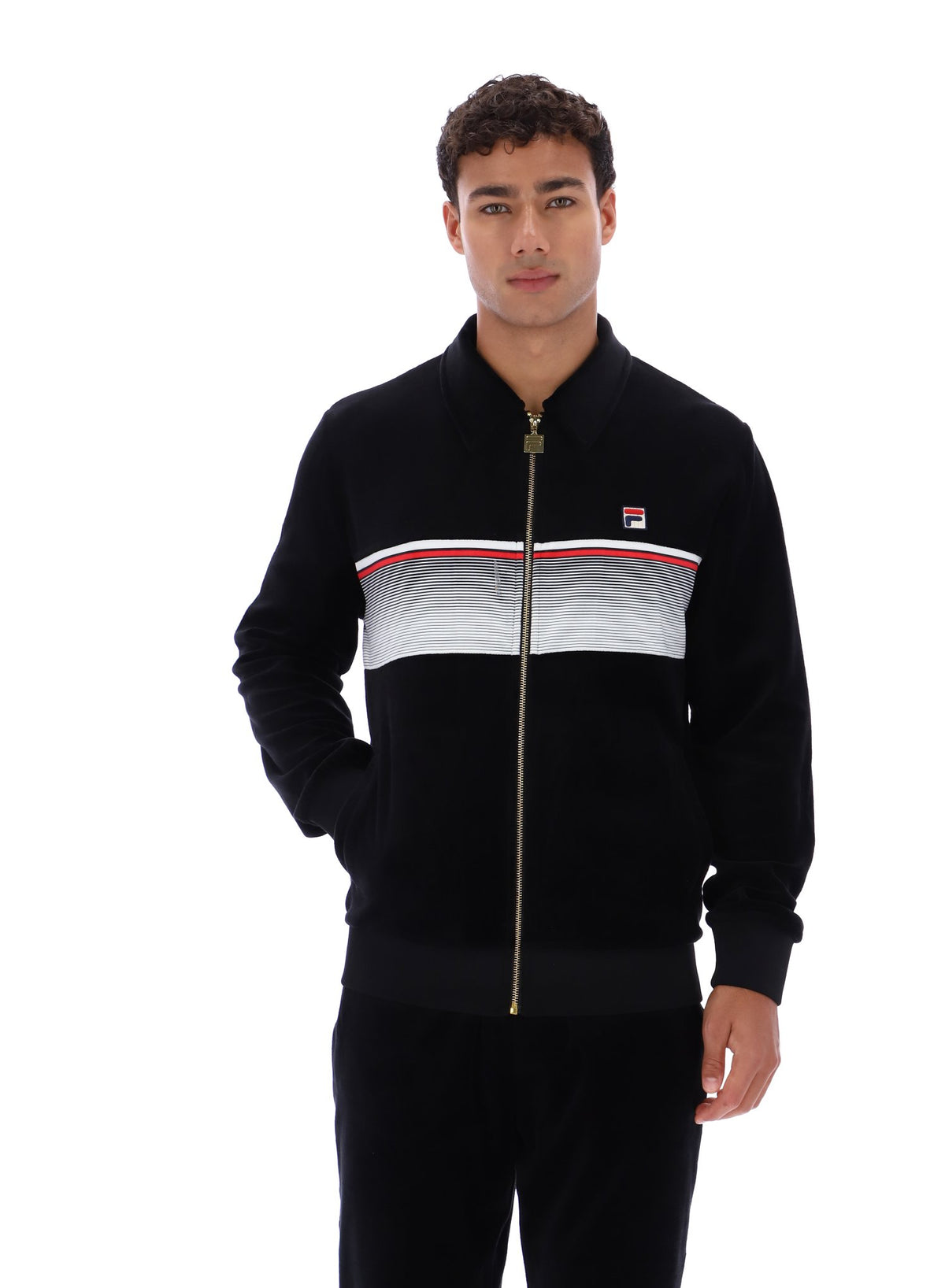 Displays a model wearing the Black 'FILA' branded Malakai Striped Track Top