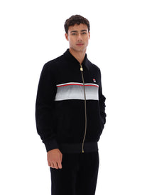 Displays a model wearing the Black 'FILA' branded Malakai Striped Track Top