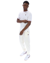 Displays a model wearing the White 'FILA' branded Marconi Essential Ringer T-Shirt