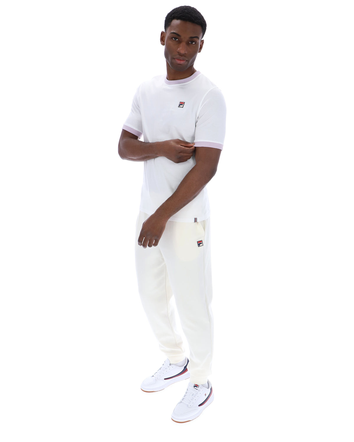 Displays a model wearing the White 'FILA' branded Marconi Essential Ringer T-Shirt