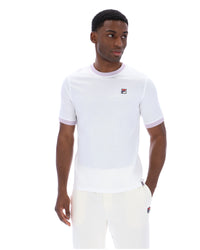 Displays a model wearing the White 'FILA' branded Marconi Essential Ringer T-Shirt