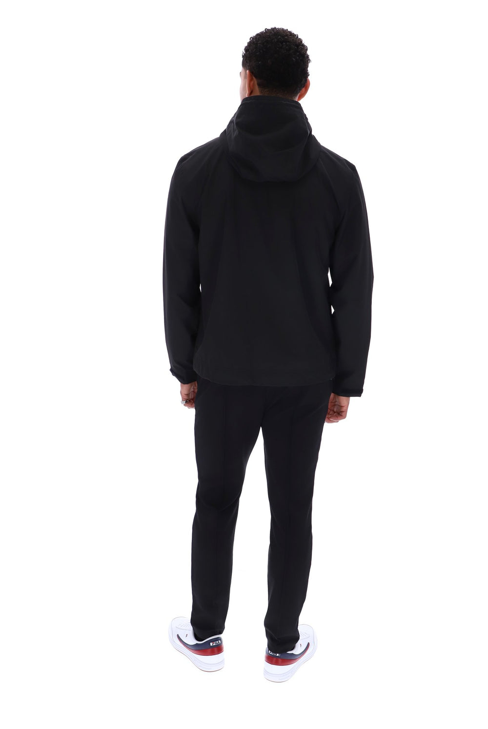 Displays a model wearing the Black 'FILA' branded Marcos Full Zip Jacket